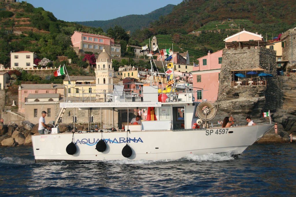 Cinque Terre only for you by a fishing boat with grilled seafood on board