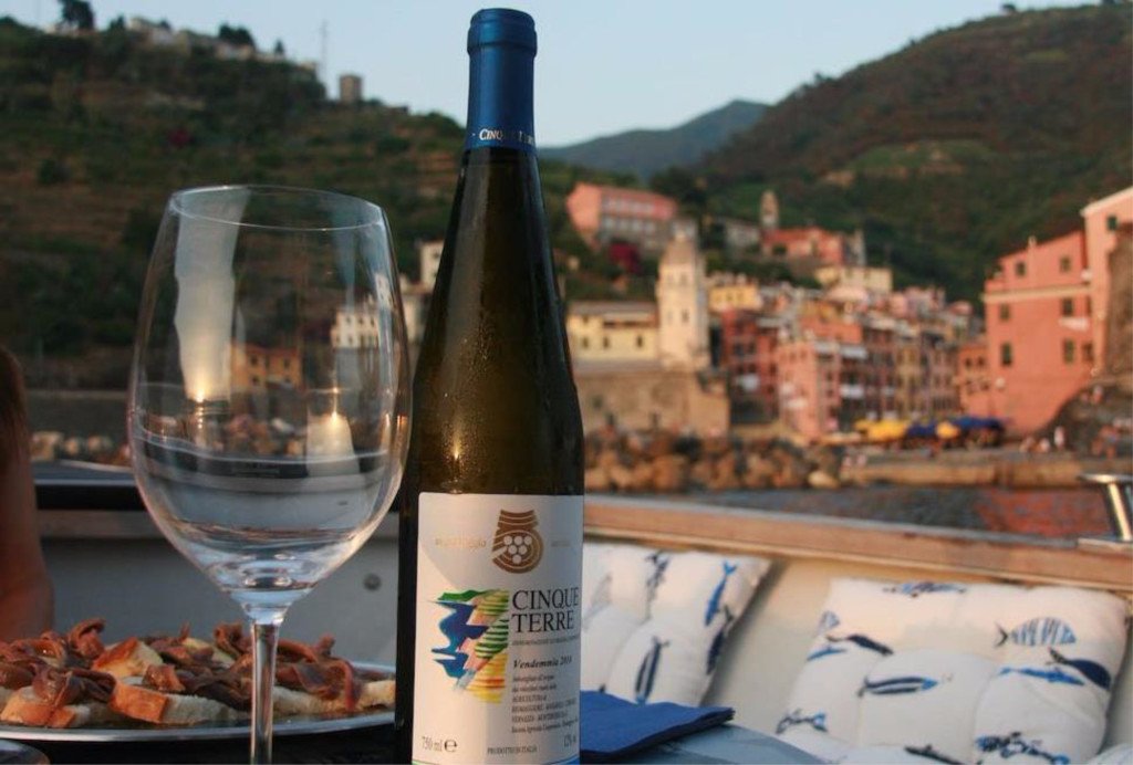 Cinque Terre only for you by a fishing boat with grilled seafood on board