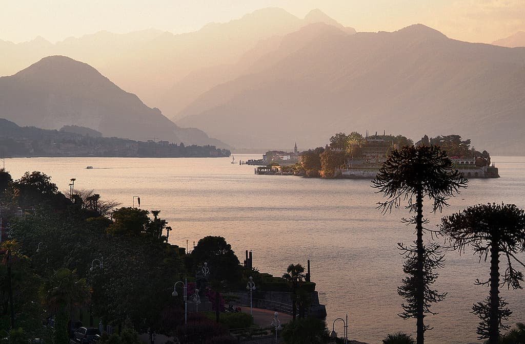 Lake Maggiore romantic tour between water and sky at the sunset