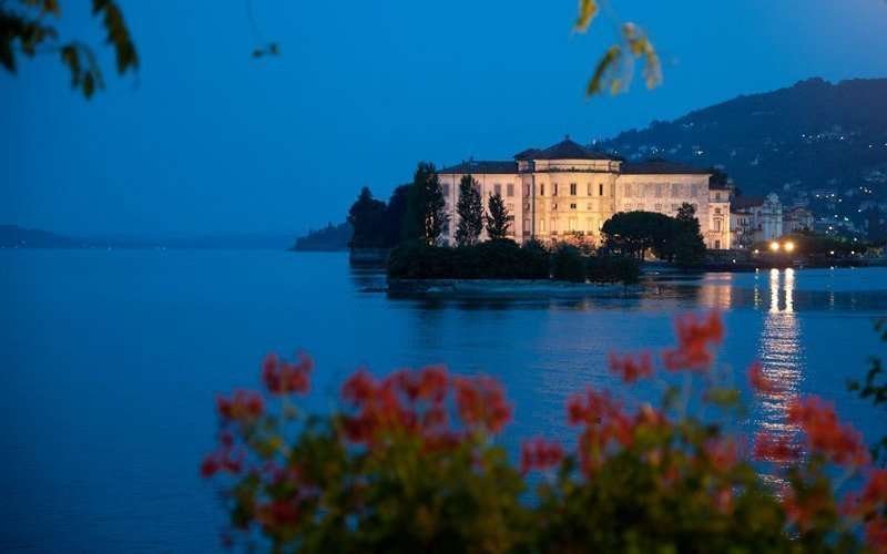 Lake Maggiore romantic tour between water and sky at the sunset