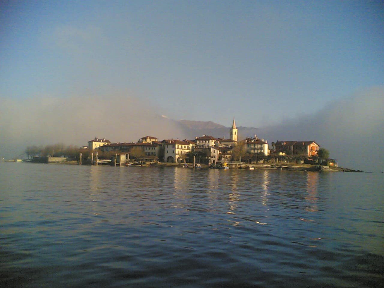Lake Maggiore vintage private cruise at sunset with aperitif